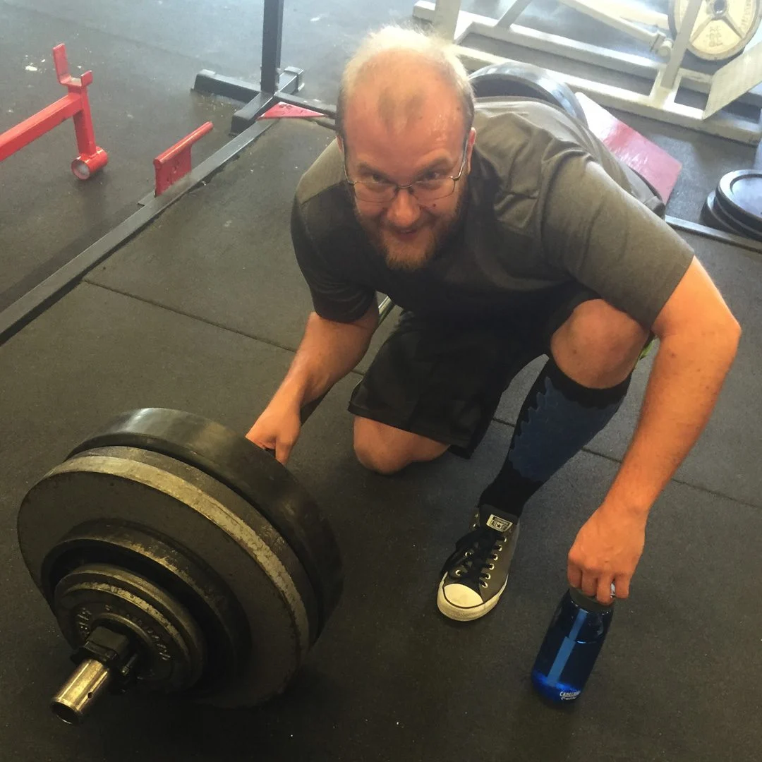 Athlete of the Month with a barbell