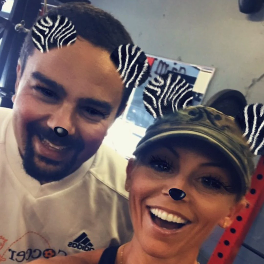 Athlete of the Month and his coach with phone filters