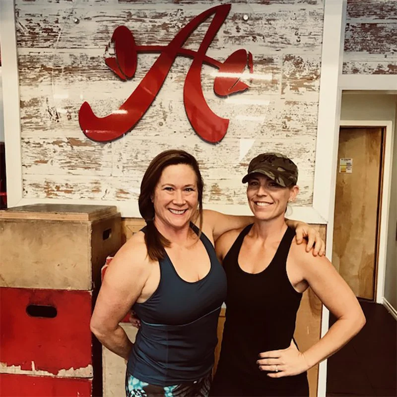 Athlete of the Month with her trainer
