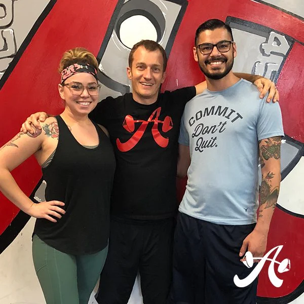athletes of the month and their coach