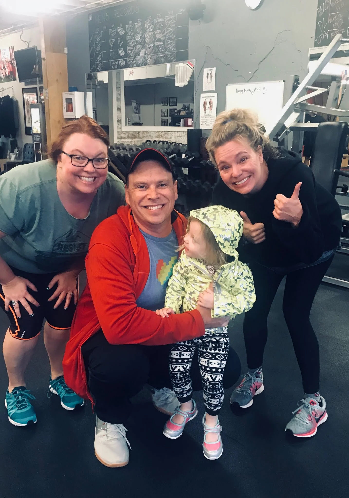 Clients posing at the gym
