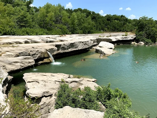 McKinney Falls with swimmers