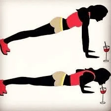 person performing a push up and drinking alcohol