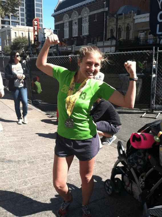 Beckie after running the Austin Marathon
