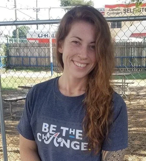 KT wearing a Be the Change tee shirt