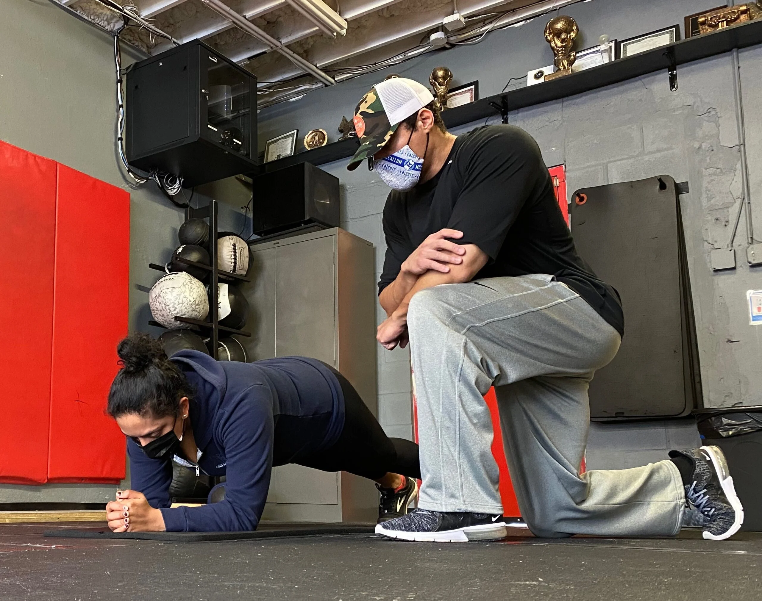 client performing a plank
