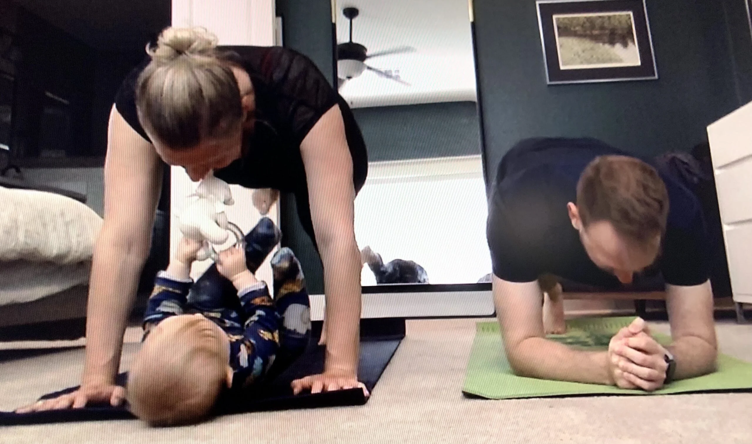 Client exercising with her baby