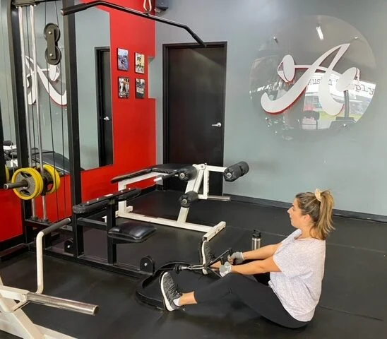 client doing seated row