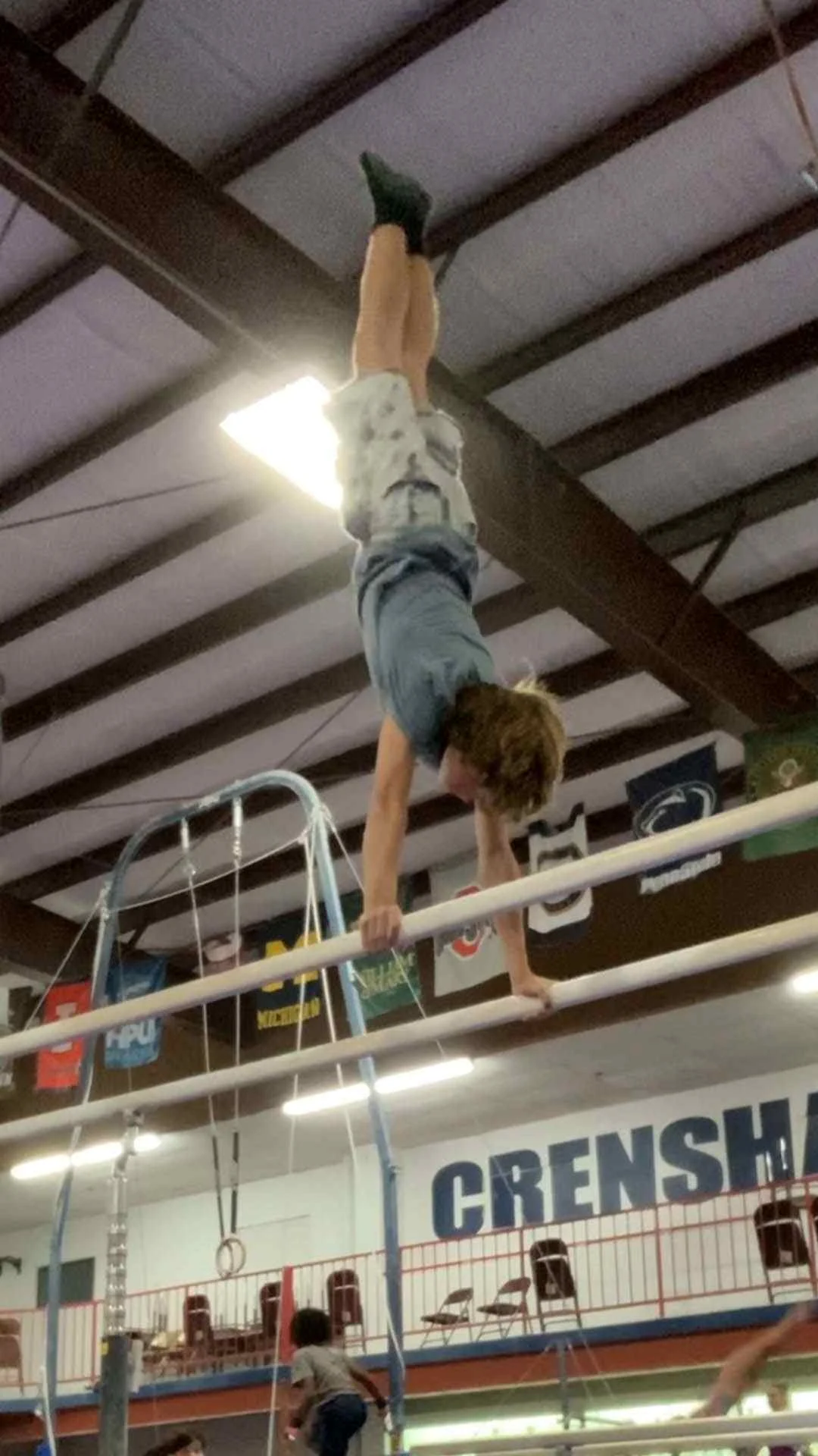 Sports performance highlight Asa on the parallel bars