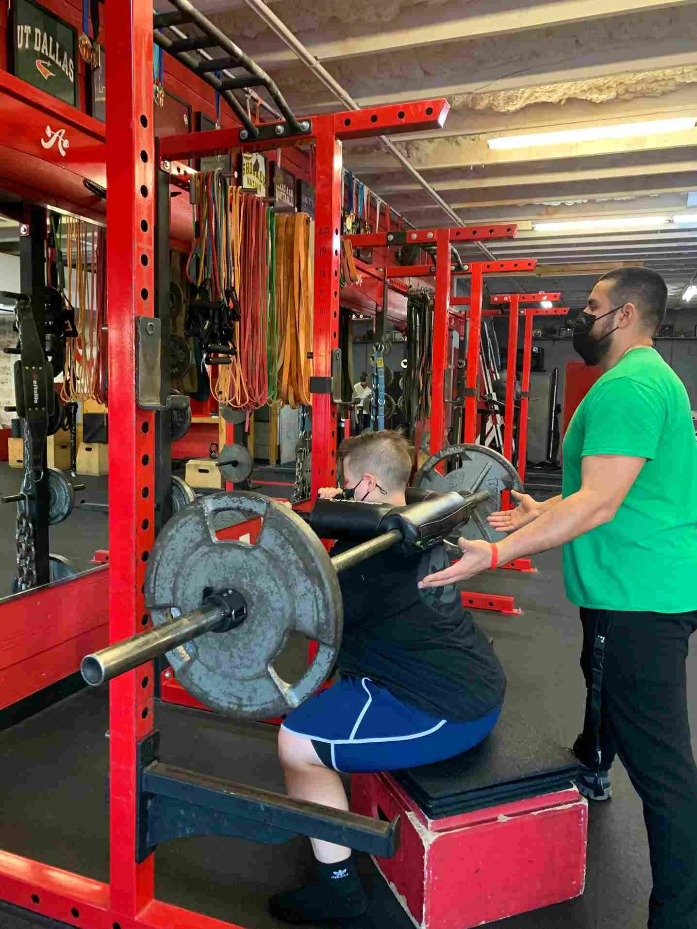 Client Highlight Court Jacinic performing a barbell squat