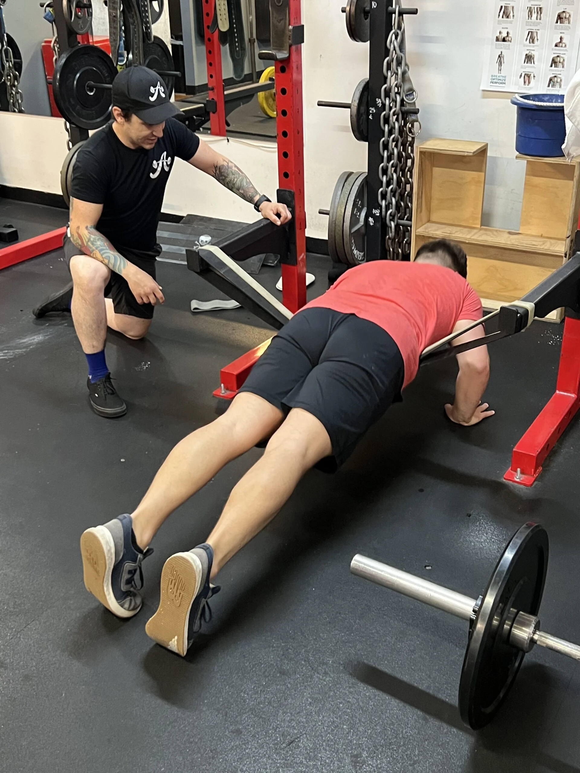 Client doing a banded push up