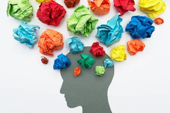 image of a profile with balls of colored paper representing mental health