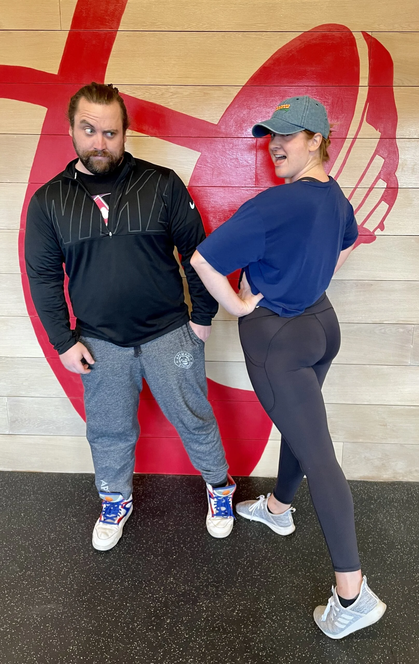 Millie and her trainer posing