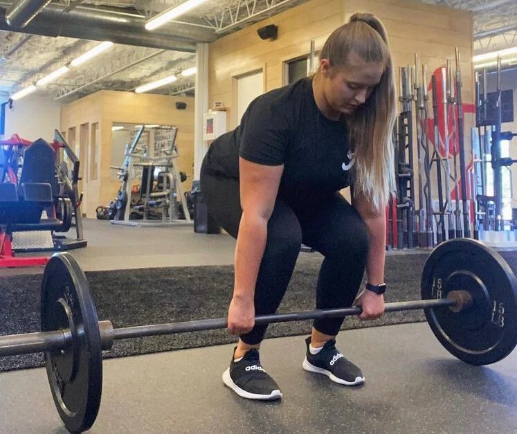 Personal trainer Niamh McWalter performing a deadlift