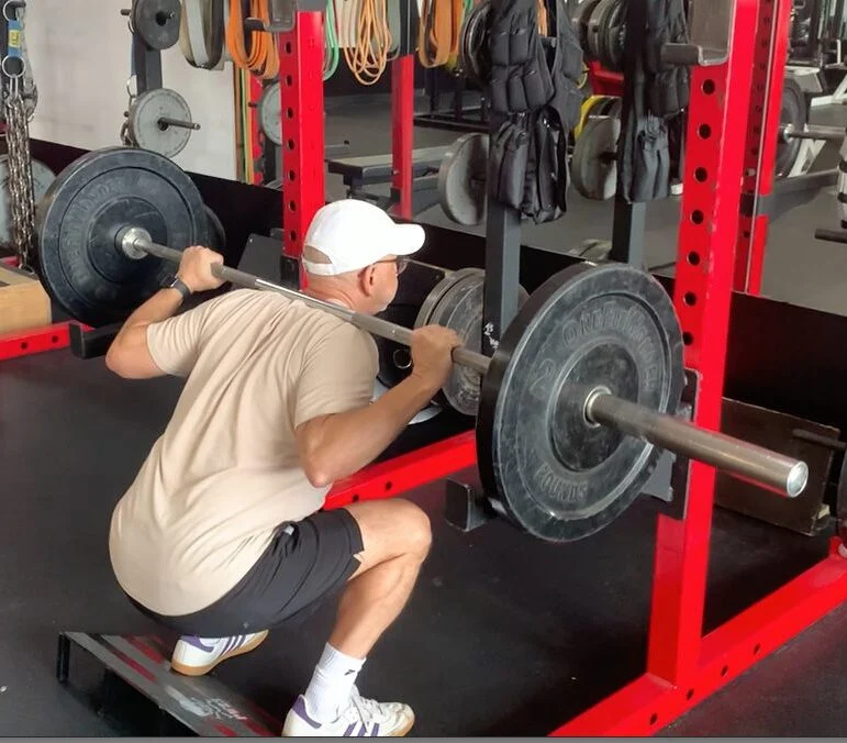 Client highlight performing a back squat
