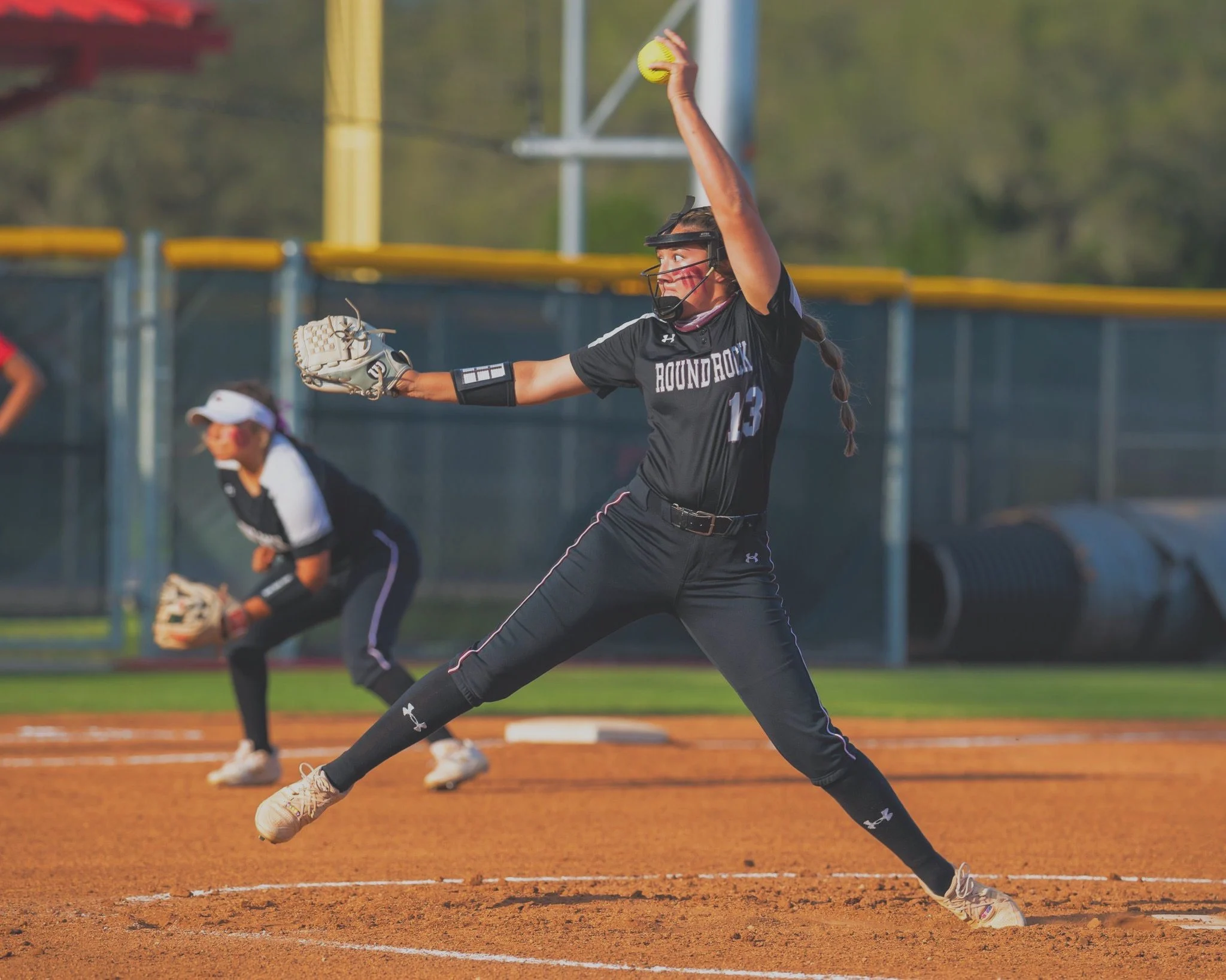 Sports performance highlight Maddy throwing a softball