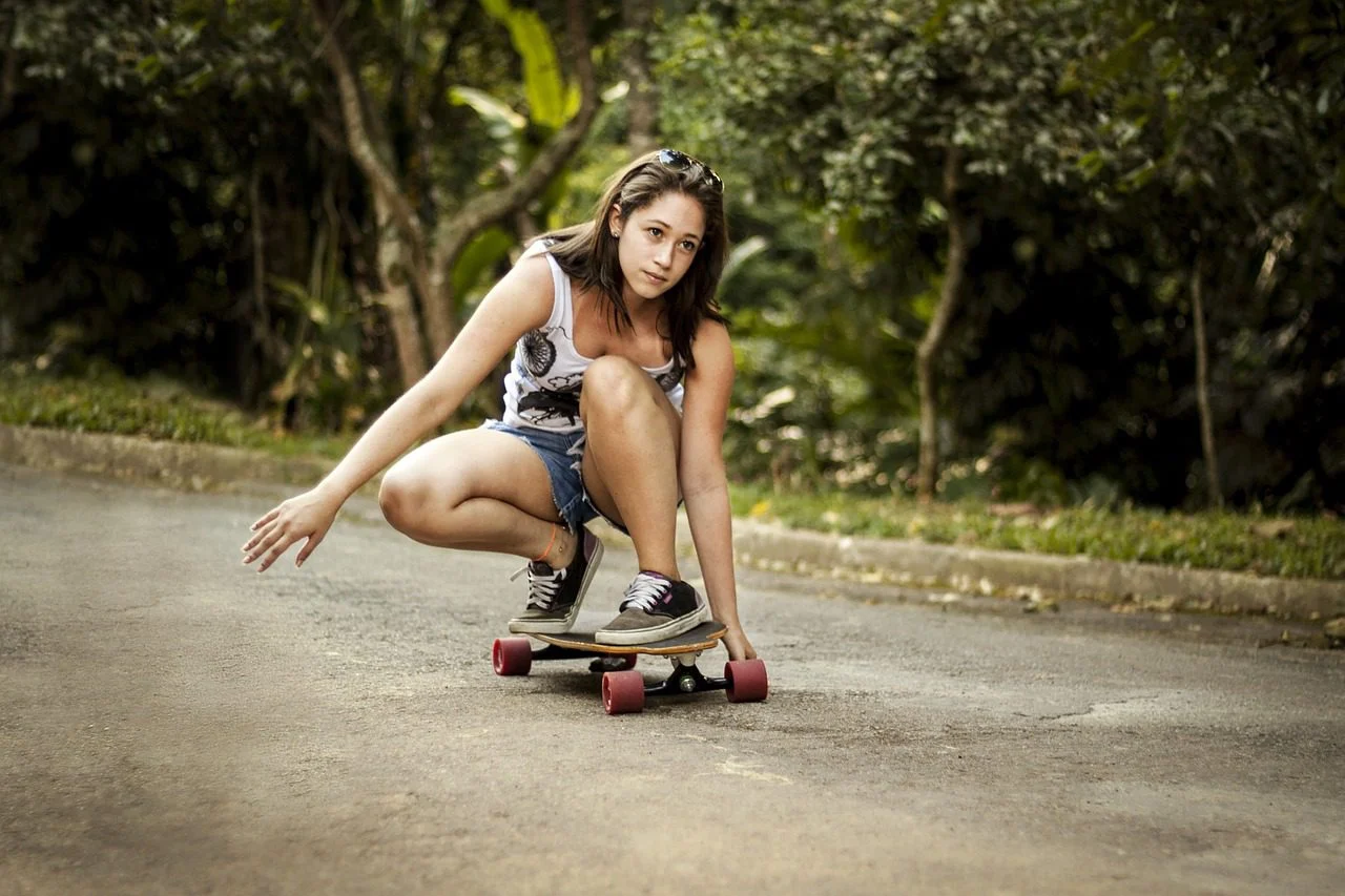 a woman skateboarding