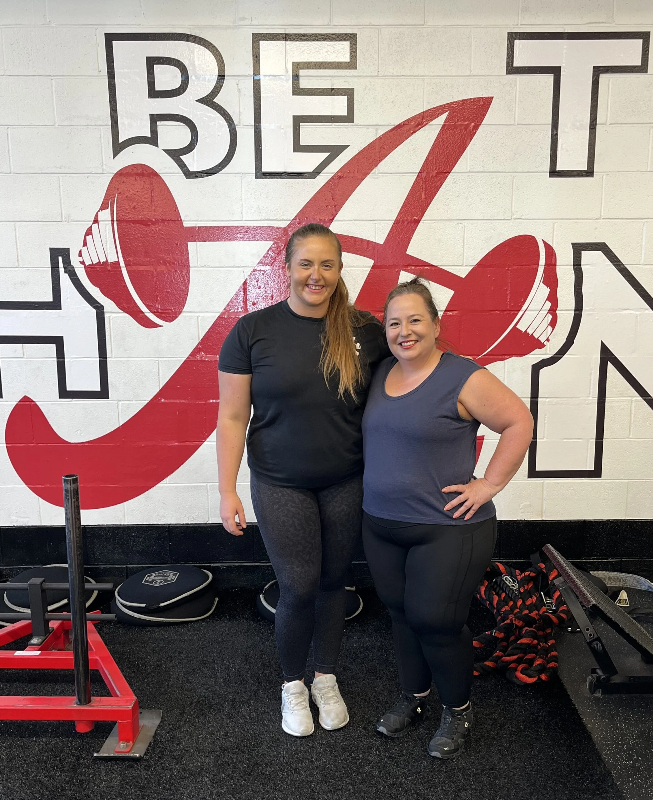 Client and trainer posing