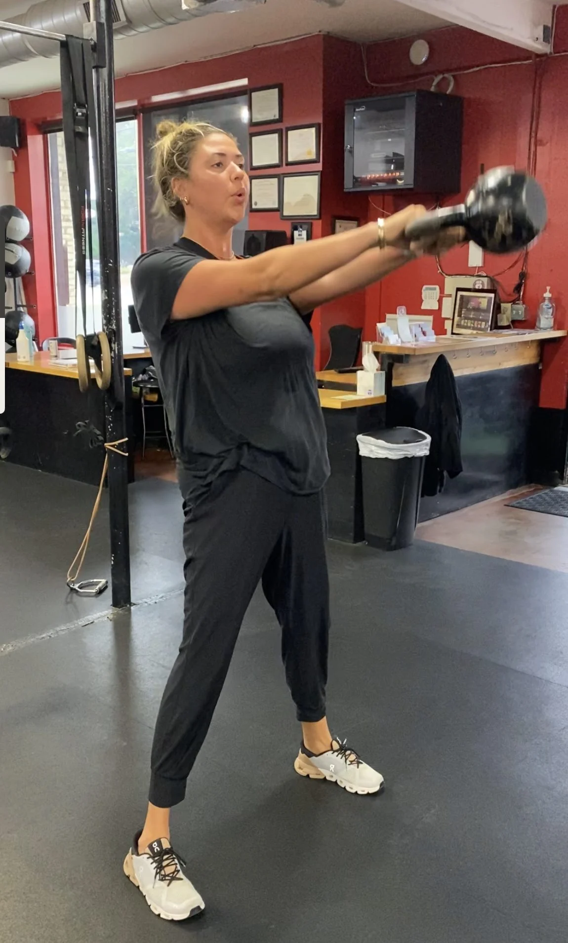 Person doing a kettlebell swing