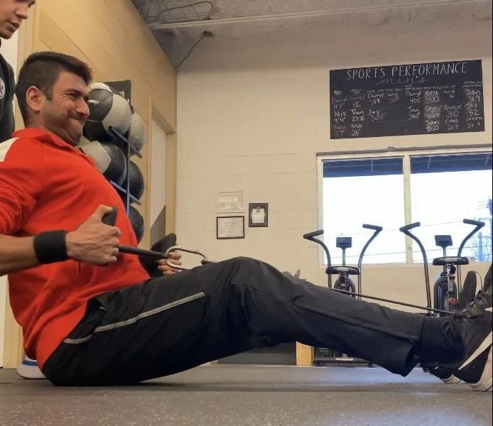 Client doing a seated row