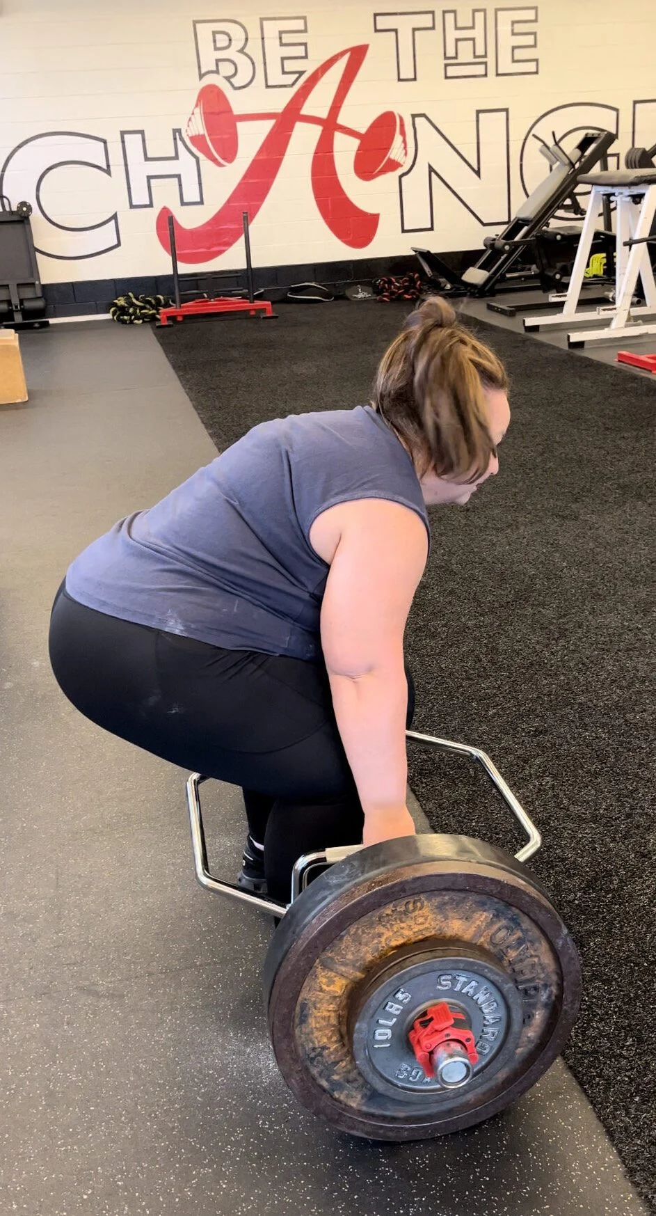 client highlight doing a trap bar deadlift