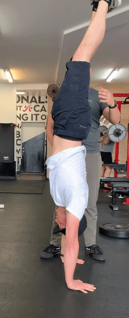 person doing a handstand