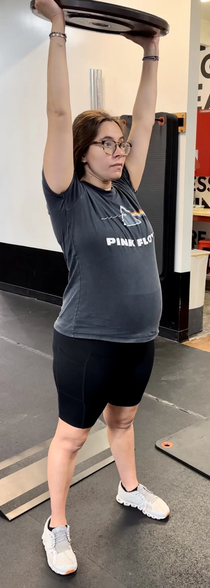 Person doing a plate raise