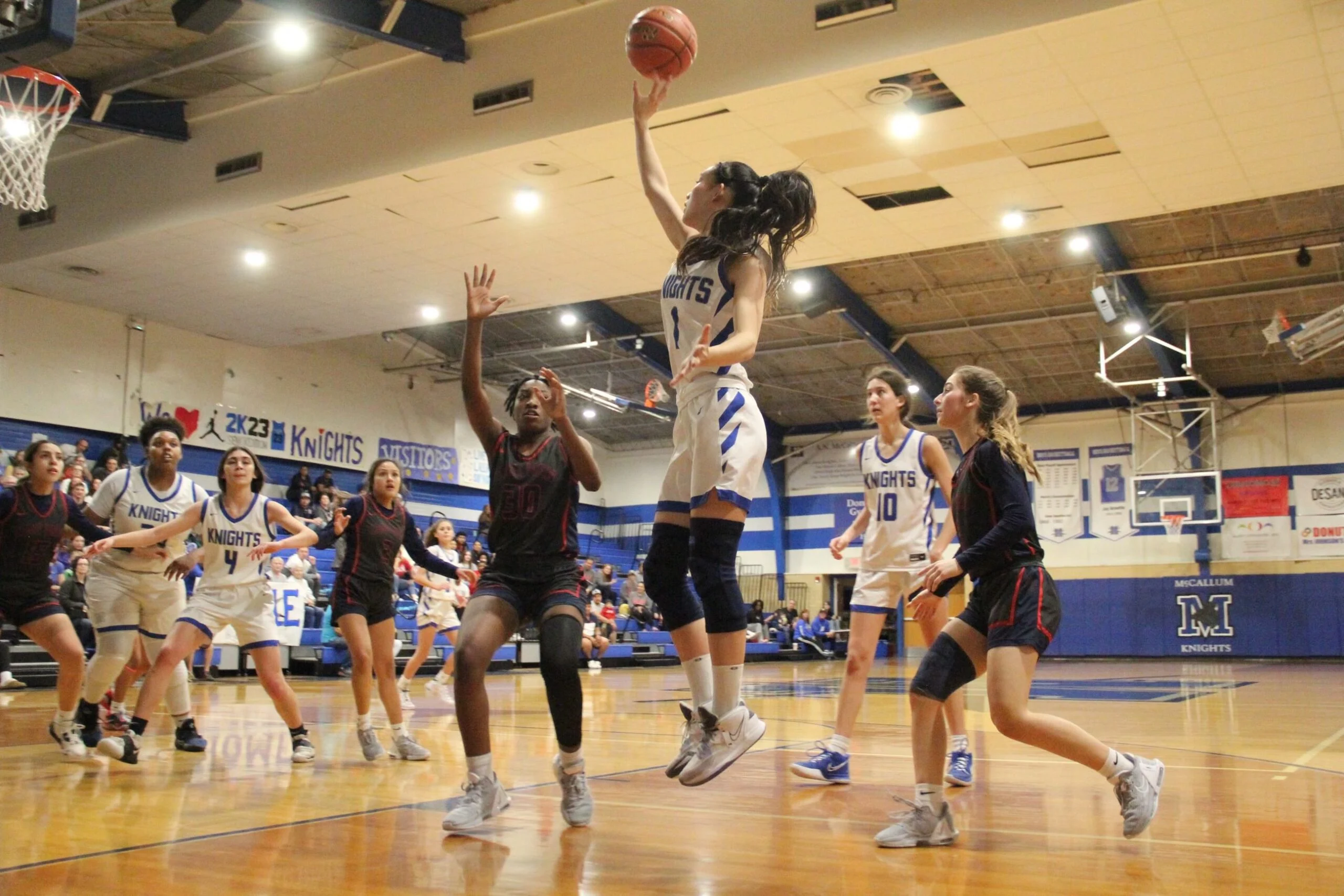 client playing basketball