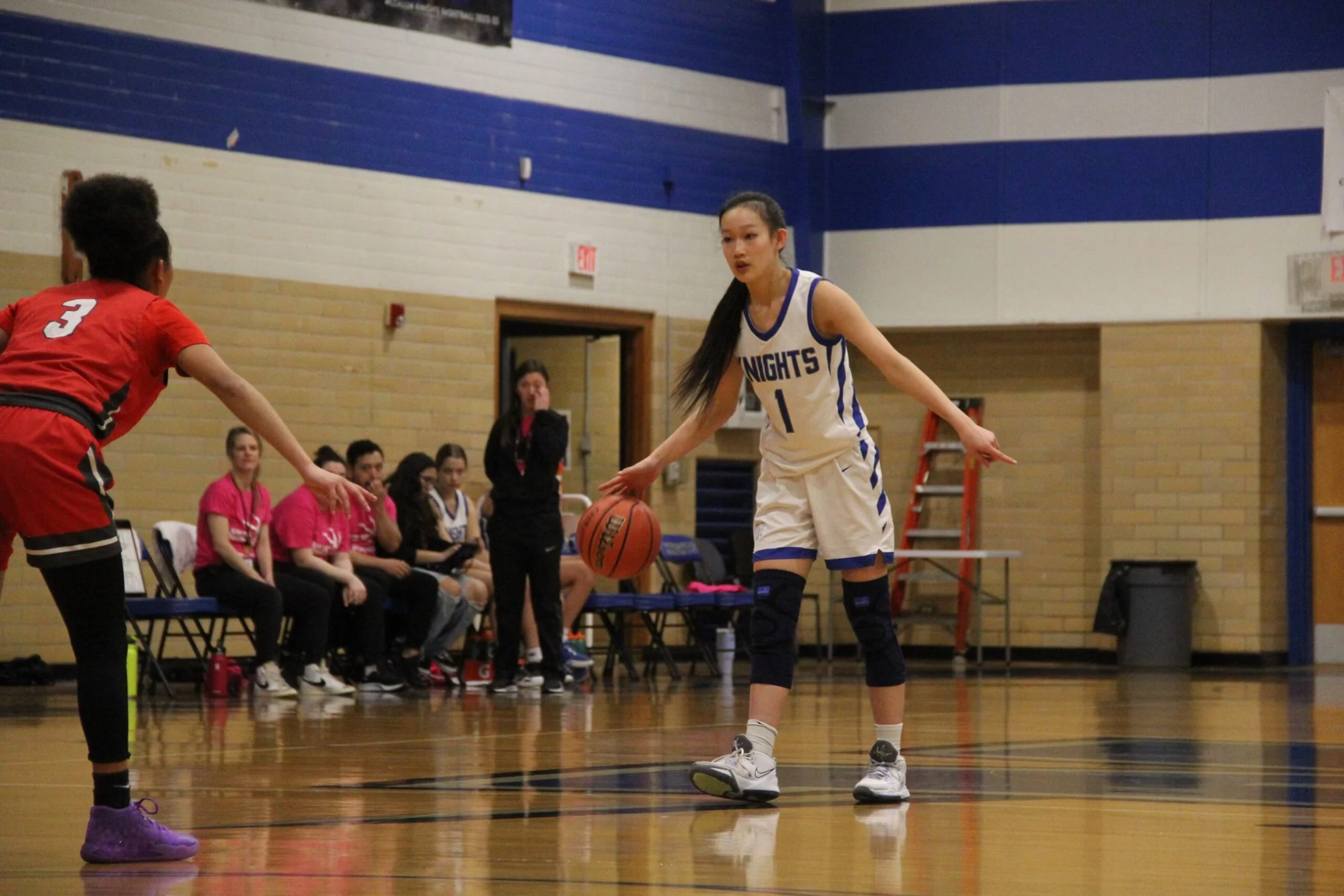 Sports Performance client playing basketball