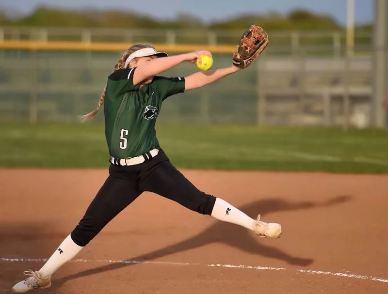 Sports Performance client playing softball