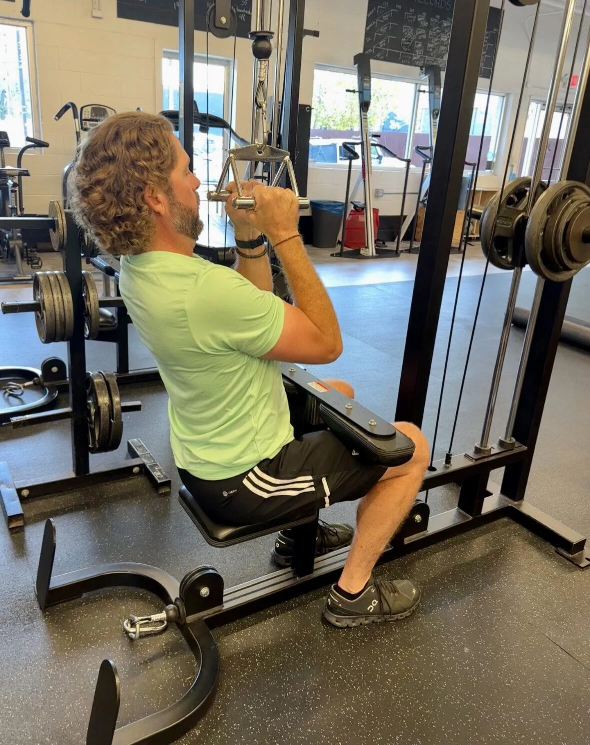 Client doing a lat pull down