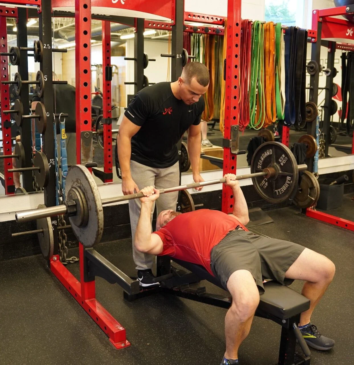 Jeff doing a barbell bench press