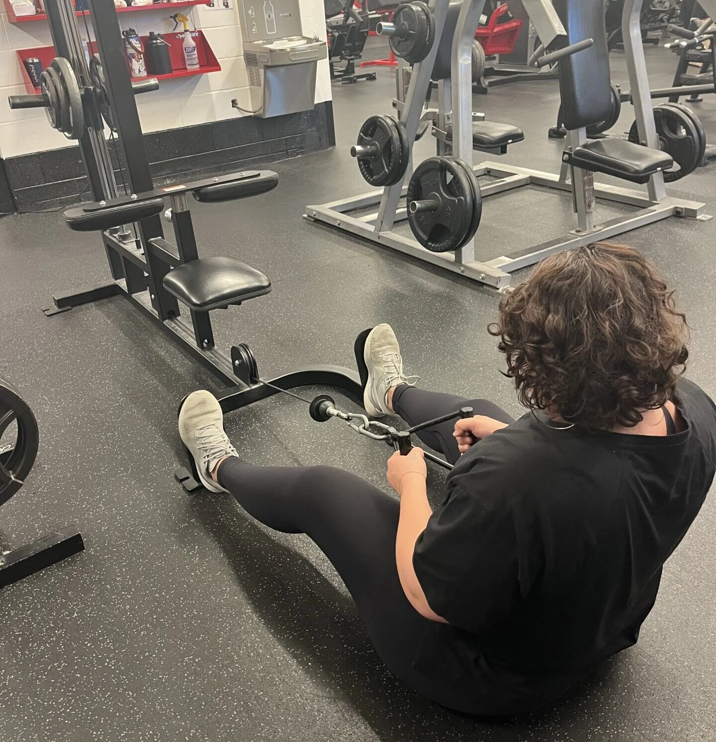 Celia doing a seated row