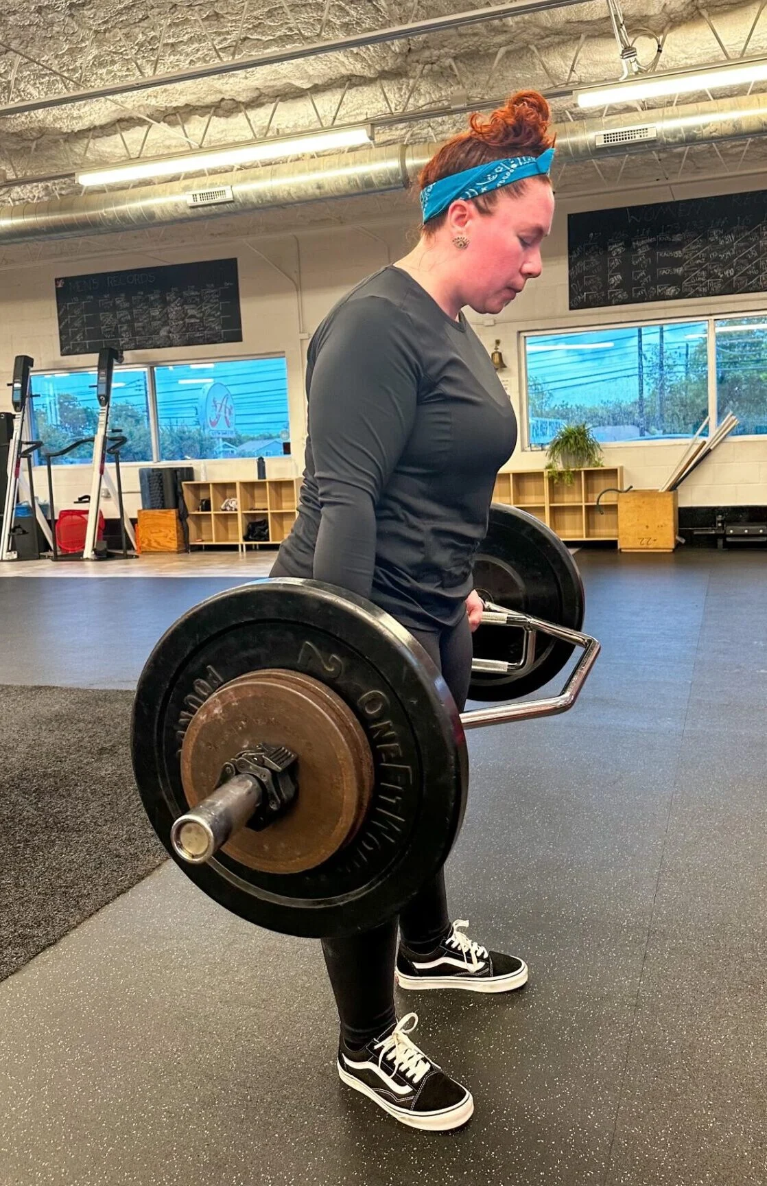Andrea doing a hex bar deadlift