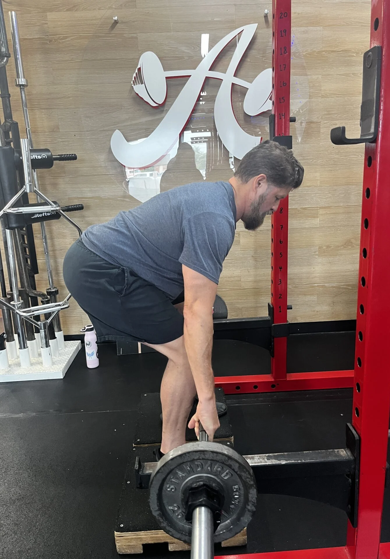 Brian doing a barbell rack pull