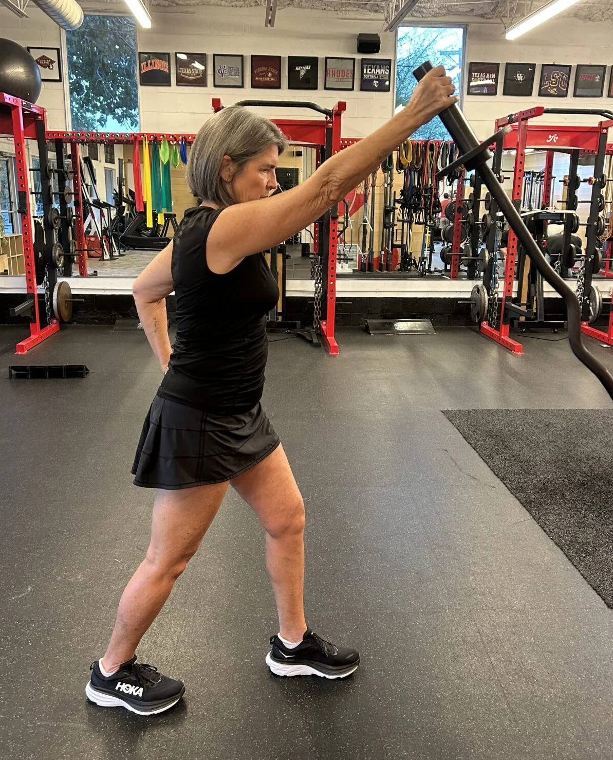 Cheryl doing a single arm landmine press