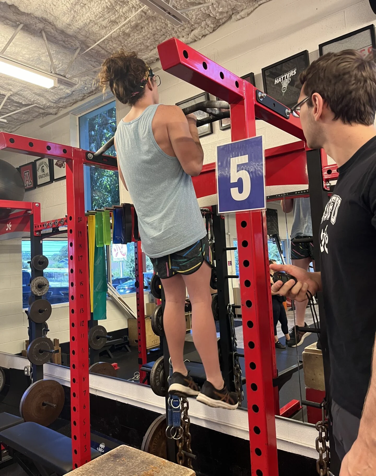 Client Highlight Brock doing a flexed arm hang at the Simply Fit Games