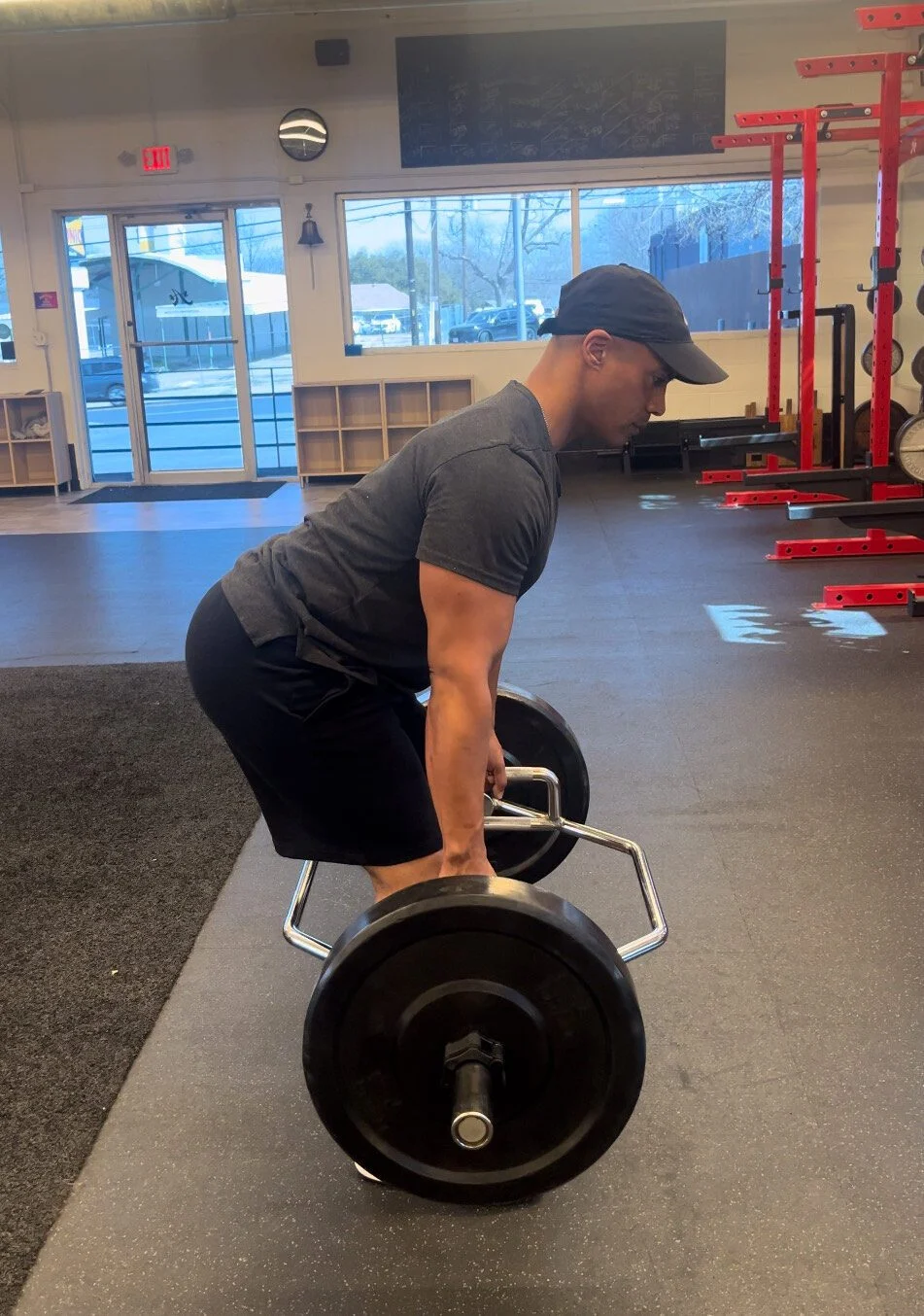 Nick Deluz performing a Hex Bar Deadlift