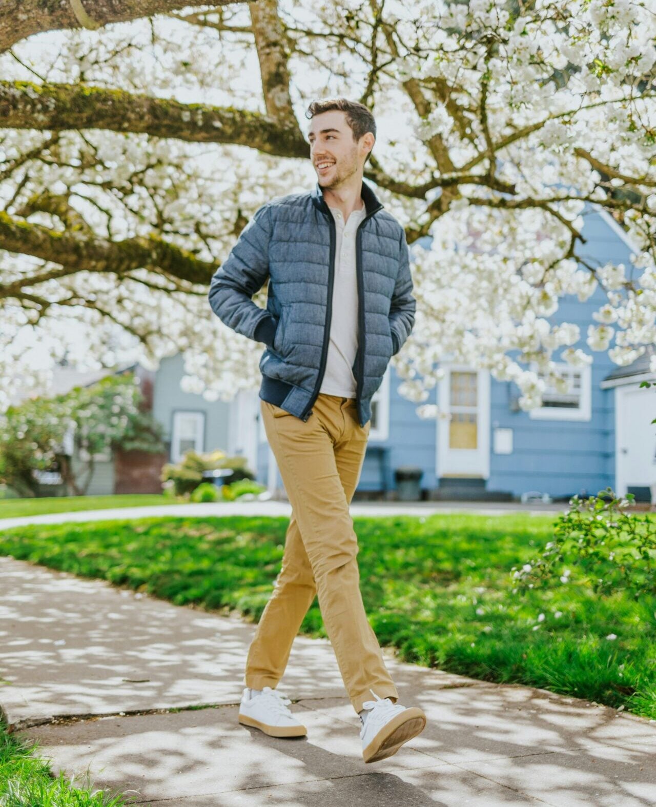 A man walking in a neighborhood, part of healthy lifestyle