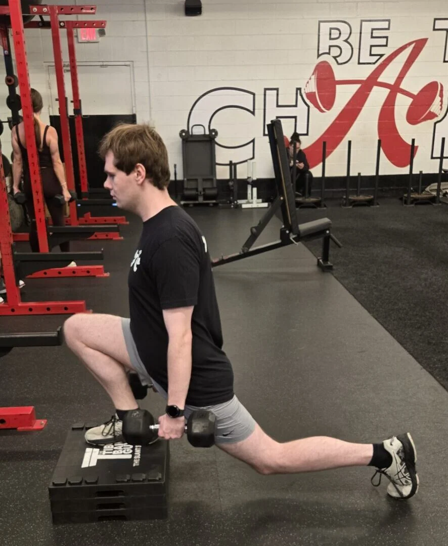Client highlight Jacob doing a front foot elevated split squat