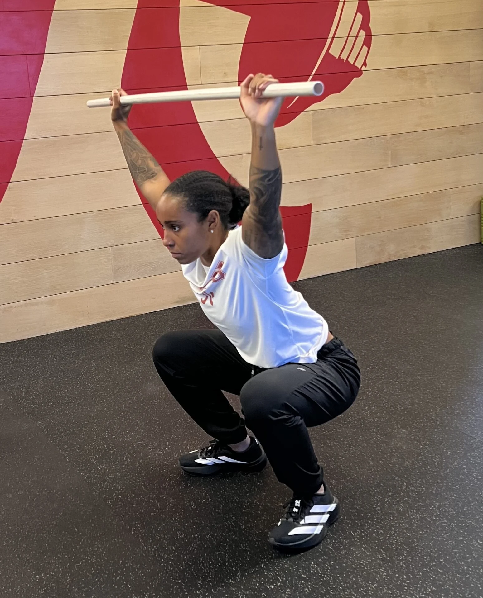 Sierra doing an overhead squat test 
