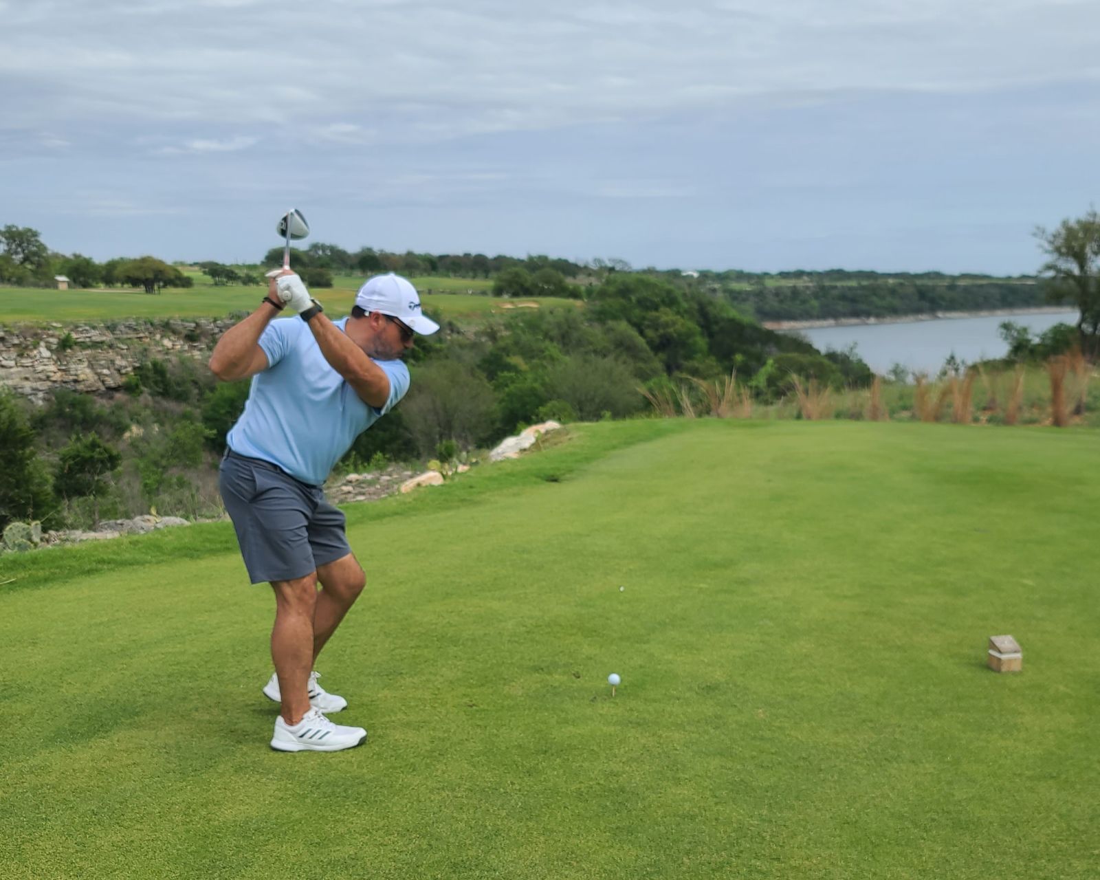 A man playing golf
